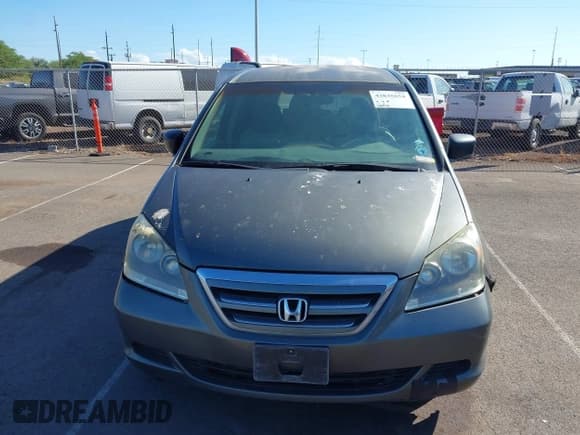 ✅ 2007 Honda Odyssey LX • VIN: 5FNRL38277B041890 • Lot: 43835654. Wystawiony na IAAI z przebiegiem 128 423 mil. Bezpłatny archiwum sprzedaży aukcyjnych z USA i szczegółowy raport historii pojazdu na DreamBid. Zdjęcie 6.