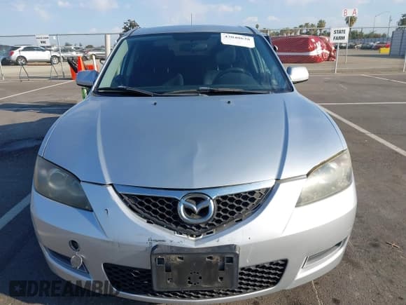 ✅ 2007 Mazda 3 i Sport • VIN: JM1BK12G571762716 • Lot: 43040638. Listed on IAAI with 87,393 mi. Free auction sales archive from the USA and detailed vehicle history report at DreamBid. Image 12.