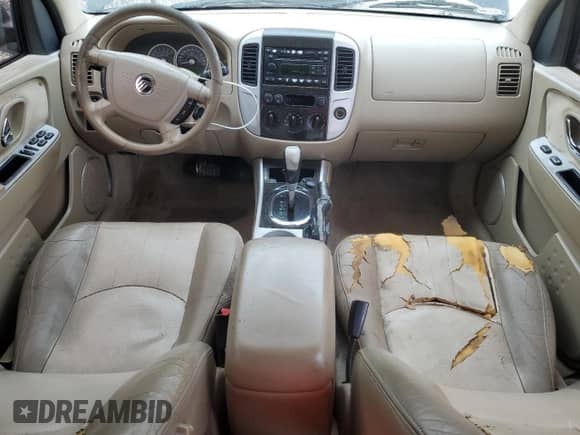 2006 Mercury Mariner Luxury с VIN 4M2YU561X6KJ11487, выставлен на аукционе Copart как лот 42571955 с пробегом 184 935 миль миль и Списание • Salvage title. История ставок и продаж доступна на DreamBid. Изображение 8.