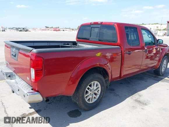 ✅ 2014 Nissan Frontier SV • VIN: 1N6AD0FR1EN766633 • Lot: 42453514. Listed on IAAI with 96,811 mi. Free auction sales archive from the USA and detailed vehicle history report at DreamBid. Image 4.