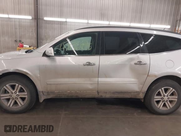 ✅ 2016 Chevrolet Traverse LT • VIN: 1GNKVGKDXGJ165682 • Lot: 42176875. Listed on IAAI with 240,342 mi. Free auction sales archive from the USA and detailed vehicle history report at DreamBid. Image 15.