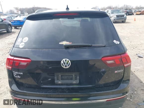 ✅ 2021 Volkswagen Tiguan SE • VIN: 3VV2B7AX4MM050282 • Лот: 42124808. Опубликован ранее на IAAI с пробегом 80 082 миль. Бесплатный доступ к архиву аукционных продаж из США и подробный отчёт об истории автомобиля на DreamBid. Изображение 17.