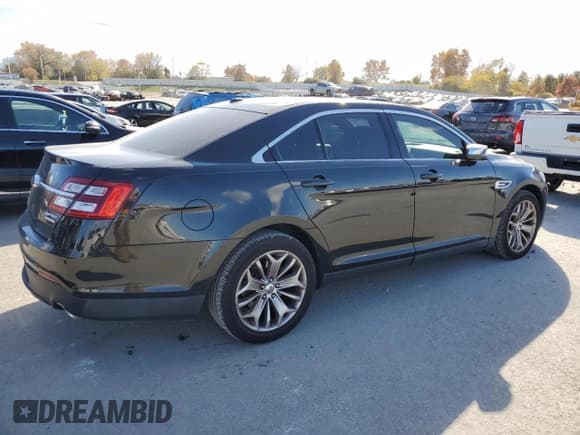 ✅ 2014 Ford Taurus Limited • VIN: 1FAHP2F89EG111545 • Лот: 92347745. Опубликован ранее на Copart с пробегом 103 958 миль. Бесплатный доступ к архиву аукционных продаж из США и подробный отчёт об истории автомобиля на DreamBid. Изображение 3.
