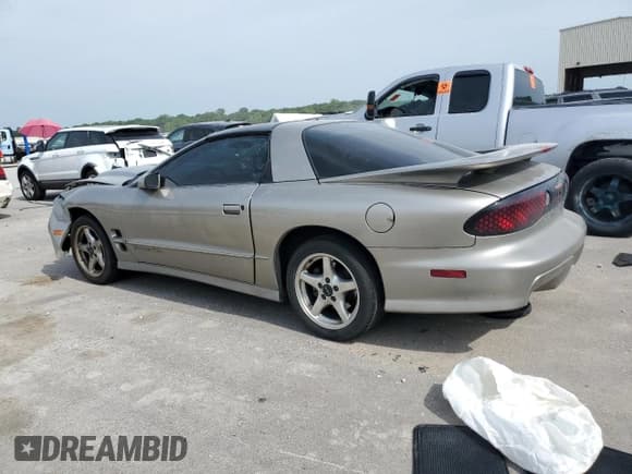 ✅ 2001 Pontiac Firebird Formula • VIN: 2G2FV22G912123611 • Lot: 56820064. Listed on Copart with 55,319 mi. Free auction sales archive from the USA and detailed vehicle history report at DreamBid. Image 2.