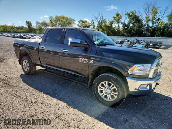 ✅ 2017 Ram 2500 Laramie • VIN: 3C6UR5FL6HG581170 • Lot: 68910205. Listed on Copart with 126,544 mi. Free auction sales archive from the USA and detailed vehicle history report at DreamBid. Image 4.