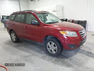 ✅ 2012 Hyundai Santa Fe GLS • VIN: 5XYZGDAG4CG135583 • Lot: 41305409. Listed on IAAI with 155,944 mi. Free auction sales archive from the USA and detailed vehicle history report at DreamBid. Image 1.