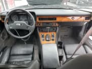 ✅ 1989 Jaguar XJS • VIN: SAJNA5849KC156340 • Lot: 81369415. Wystawiony na Copart z przebiegiem 82 457 mil. Bezpłatny archiwum sprzedaży aukcyjnych z USA i szczegółowy raport historii pojazdu na DreamBid. Zdjęcie 8.