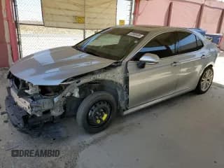 ✅ 2020 Toyota Camry Hybrid XLE • VIN: 4T1F31AK8LU017614 • Lot: 52980495. Listed on Copart with 87,077 mi. Free auction sales archive from the USA and detailed vehicle history report at DreamBid. Image 1.