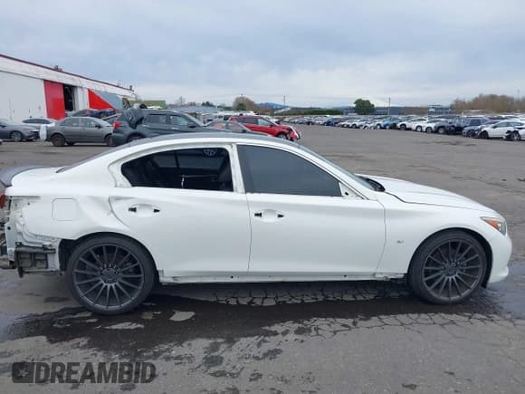 ✅ 2014 Infiniti Q50 Premium • VIN: JN1BV7AP8EM671403 • Lot: 41837716. Listed on IAAI with 115,058 mi. Free auction sales archive from the USA and detailed vehicle history report at DreamBid. Image 14.