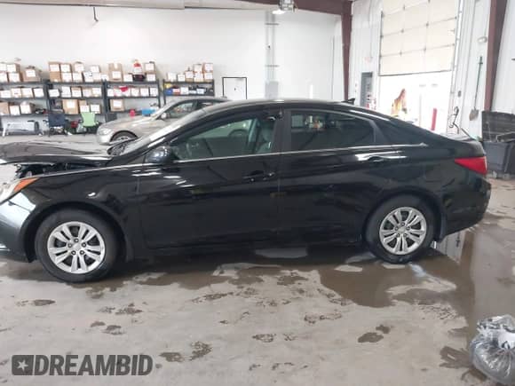 2011 Hyundai Sonata GLS z VIN 5NPEB4AC1BH284017, wystawiony jako IAAI lot #43241765 z przebiegiem 112 258 mil mil oraz . Historia ofert i sprzedaży dostępna na DreamBid. Obrazek 14.