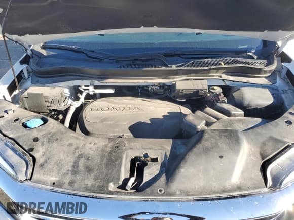 ✅ 2021 Honda Pilot EX-L • VIN: 5FNYF6H55MB061615 • Lot: 84731665. Listed on Copart with 80,257 mi. Free auction sales archive from the USA and detailed vehicle history report at DreamBid. Image 12.