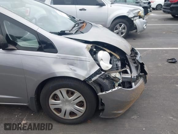 ✅ 2009 Honda Fit • VIN: JHMGE88289S055025 • Lot: 43424630. Wystawiony na IAAI z przebiegiem 319 864 mil. Bezpłatny archiwum sprzedaży aukcyjnych z USA i szczegółowy raport historii pojazdu na DreamBid. Zdjęcie 6.