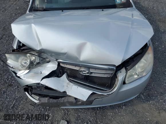 2009 Hyundai Elantra GLS z VIN KMHDU46D49U594519, wystawiony jako Copart lot #71169994 z przebiegiem 96 875 mil mil oraz Szkoda całkowita • Salvage title. Historia ofert i sprzedaży dostępna na DreamBid. Obrazek 12.