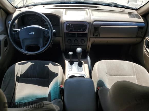 ✅ 2001 Jeep Grand Cherokee Laredo • VIN: 1J4GW48S11C567869 • Lot: 58847415. Listed on Copart with 217,279 mi. Free auction sales archive from the USA and detailed vehicle history report at DreamBid. Image 8.