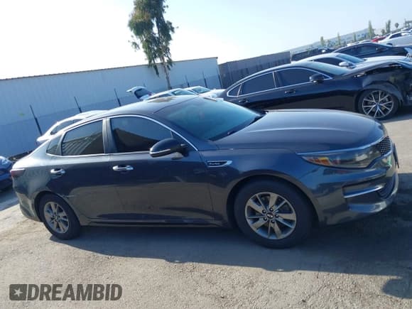 ✅ 2017 Kia Optima LX • VIN: 5XXGT4L14HG173077 • Lot: 42502823. Listed on IAAI with 114,047 mi. Free auction sales archive from the USA and detailed vehicle history report at DreamBid. Image 13.
