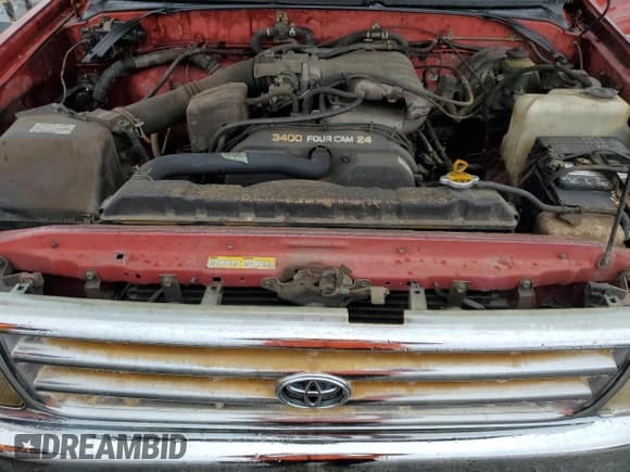 ✅ 1995 Toyota T100 DX • VIN: JT4VD12E2S0002571 • Лот: 89274925. Опубликован ранее на Copart с пробегом 257 083 миль. Бесплатный доступ к архиву аукционных продаж из США и подробный отчёт об истории автомобиля на DreamBid. Изображение 11.