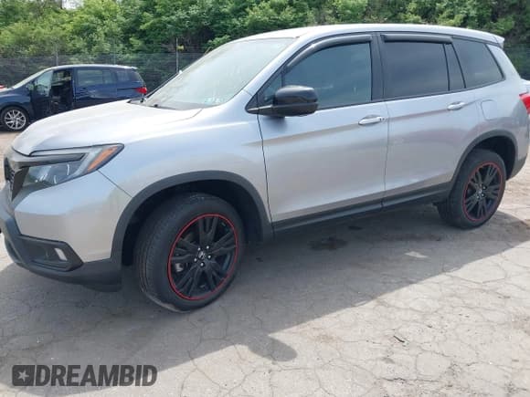 ✅ 2019 Honda Passport Sport • VIN: 5FNYF8H27KB026413 • Lot: 42128342. Listed on IAAI with 83,943 mi. Free auction sales archive from the USA and detailed vehicle history report at DreamBid. Image 18.