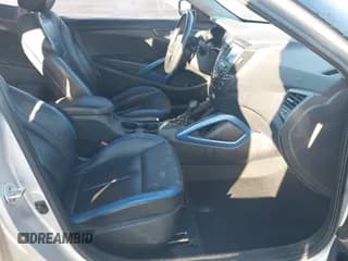 ✅ 2013 Hyundai Veloster Turbo • VIN: KMHTC6AE8DU107616 • Lot: 41293348. Listed on IAAI with 152,567 mi. Free auction sales archive from the USA and detailed vehicle history report at DreamBid. Image 5.