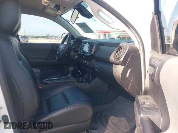 ✅ 2023 Toyota Tacoma SR • VIN: 3TYRZ5CN3PT027187 • Lot: 42334368. Listed on IAAI with 37,819 mi. Free auction sales archive from the USA and detailed vehicle history report at DreamBid. Image 5.