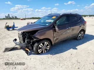 2014 Hyundai Tucson Limited z VIN KM8JU3AG7EU888134, wystawiony jako Copart lot #70963915 z przebiegiem 125 059 mil mil oraz Szkoda całkowita • Salvage title. Historia ofert i sprzedaży dostępna na DreamBid. Obrazek 1.