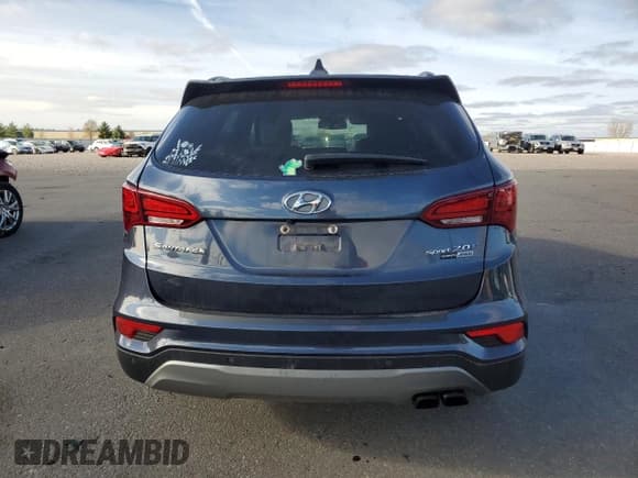 ✅ 2017 Hyundai Santa Fe Ultimate • VIN: 5XYZWDLA3HG469154 • Lot: 91375315. Listed on Copart with 136,432 mi. Free auction sales archive from the USA and detailed vehicle history report at DreamBid. Image 6.