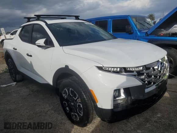 2022 Hyundai Santa Cruz SEL с VIN 5NTJCDAE4NH037836, выставлен на аукционе Copart как лот 78938864 с пробегом 18 226 миль миль и На запчасти • Non repairable. История ставок и продаж доступна на DreamBid. Изображение 4.