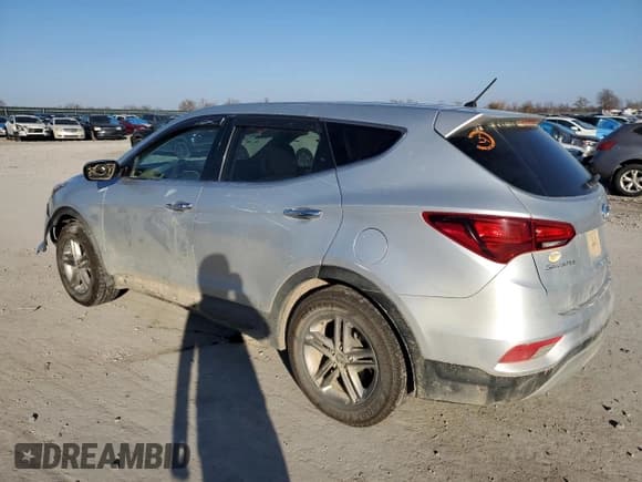 ✅ 2018 Hyundai Santa Fe 2.4L • VIN: 5XYZTDLBXJG550983 • Лот: 82901933. Опубликован ранее на Copart с пробегом 105 121 миль. Бесплатный доступ к архиву аукционных продаж из США и подробный отчёт об истории автомобиля на DreamBid. Изображение 2.
