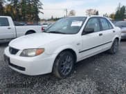 ✅ 2003 Mazda Protege DX • VIN: JM1BJ225331141069 • Лот: 43688727. Опубликован ранее на IAAI с пробегом 136 202 миль. Бесплатный доступ к архиву аукционных продаж из США и подробный отчёт об истории автомобиля на DreamBid. Изображение 17.