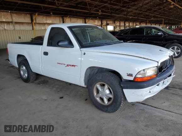 ✅ 1999 Dodge Dakota SLT • VIN: 1B7FL26X6XS180827 • Lot: 85789944. Wystawiony na Copart z przebiegiem 85 166 mil. Bezpłatny archiwum sprzedaży aukcyjnych z USA i szczegółowy raport historii pojazdu na DreamBid. Zdjęcie 4.