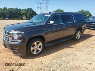 ✅ 2016 Chevrolet Suburban LT • VIN: 1GNSCHKC4GR422923 • Lot: 69990235. Listed on Copart with 100,146 mi. Free auction sales archive from the USA and detailed vehicle history report at DreamBid. Image 1.