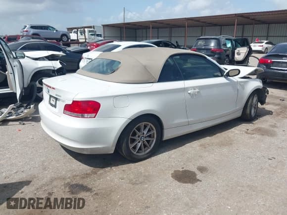 ✅ 2011 BMW 1 Series 128i • VIN: WBAUL7C54BVM79311 • Лот: 42510193. Опубликован ранее на IAAI с пробегом 85 816 миль. Бесплатный доступ к архиву аукционных продаж из США и подробный отчёт об истории автомобиля на DreamBid. Изображение 4.