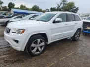 ✅ 2016 Jeep Grand Cherokee Overland • VIN: 1C4RJFCG5GC385029 • Lot: 80877655. Listed on Copart with 111,235 mi. Free auction sales archive from the USA and detailed vehicle history report at DreamBid. Image 1.