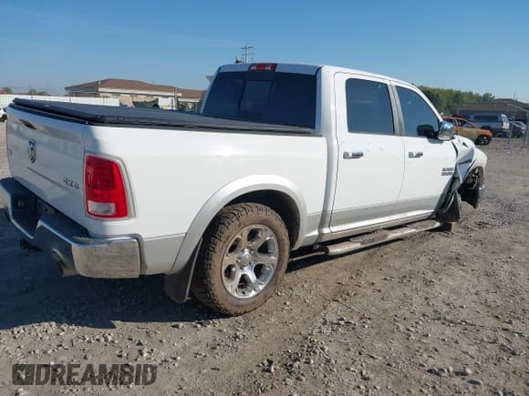 ✅ 2014 Ram 1500 Laramie • VIN: 1C6RR7NT1ES309553 • Lot: 43333568. Wystawiony na IAAI z przebiegiem 172 680 mil. Bezpłatny archiwum sprzedaży aukcyjnych z USA i szczegółowy raport historii pojazdu na DreamBid. Zdjęcie 4.