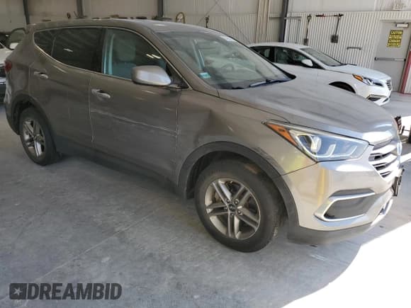 ✅ 2018 Hyundai Santa Fe 2.4L • VIN: 5NMZT3LB7JH085935 • Лот: 84585315. Опубликован ранее на Copart с пробегом 121 027 миль. Бесплатный доступ к архиву аукционных продаж из США и подробный отчёт об истории автомобиля на DreamBid. Изображение 4.
