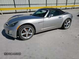 2009 Saturn Sky Red Line z VIN 1G8MT35X79Y104008, wystawiony jako Copart lot #90717725 z przebiegiem 94 455 mil mil oraz Szkoda całkowita • Salvage title. Historia ofert i sprzedaży dostępna na DreamBid. Obrazek 1.