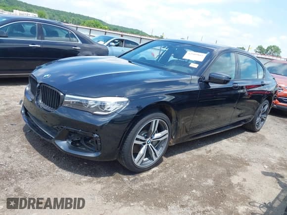 ✅ 2019 BMW 7 Series 740i • VIN: WBA7E2C5XKB217756 • Lot: 42509802. Listed on IAAI with 75,667 mi. Free auction sales archive from the USA and detailed vehicle history report at DreamBid. Image 2.