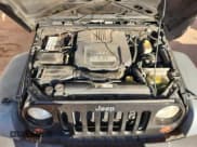 ✅ 2013 Jeep Wrangler Unlimited Sport • VIN: 1C4BJWDG5DL626664 • Лот: 82737655. Опубликован ранее на Copart с пробегом 157 447 миль. Бесплатный доступ к архиву аукционных продаж из США и подробный отчёт об истории автомобиля на DreamBid. Изображение 11.