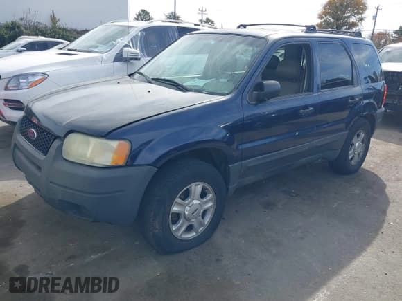 ✅ 2003 Ford Escape XLT Popular • VIN: 1FMYU03103KA70873 • Lot: 43625067. Listed on IAAI with 221,621 mi. Free auction sales archive from the USA and detailed vehicle history report at DreamBid. Image 2.