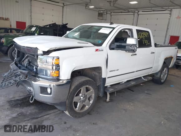 ✅ 2015 Chevrolet Silverado 2500HD LT • VIN: 1GC1KVE83FF119760 • Lot: 42693479. Listed on IAAI with 329,481 mi. Free auction sales archive from the USA and detailed vehicle history report at DreamBid. Image 2.