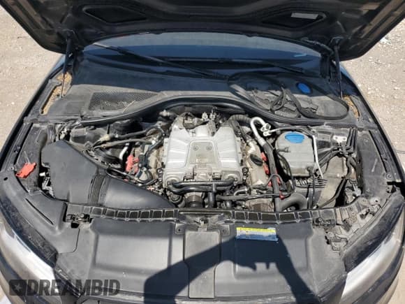 ✅ 2015 Audi A7 Prestige • VIN: WAU2GAFC2FN017130 • Лот: 63340535. Опубликован ранее на Copart с пробегом 131 648 миль. Бесплатный доступ к архиву аукционных продаж из США и подробный отчёт об истории автомобиля на DreamBid. Изображение 11.