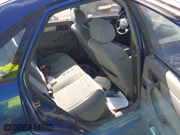 ✅ 2005 Suzuki Forenza S • VIN: KL5JD56Z85K111425 • Lot: 41421881. Listed on IAAI with 18,478 mi. Free auction sales archive from the USA and detailed vehicle history report at DreamBid. Image 8.