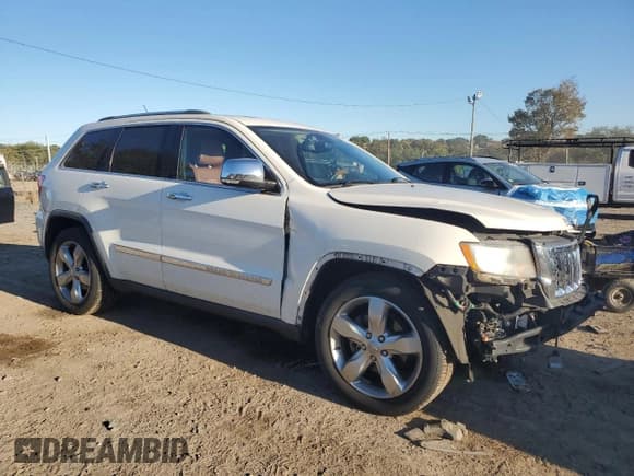 ✅ 2012 Jeep Grand Cherokee Overland • VIN: 1C4RJFCG3CC345994 • Lot: 86448425. Listed on Copart with 126,138 mi. Free auction sales archive from the USA and detailed vehicle history report at DreamBid. Image 4.