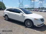 ✅ 2015 Lincoln MKT EcoBoost • VIN: 2LMHJ5AT0FBL02529 • Лот: 42833087. Опубликован ранее на IAAI с пробегом 127 473 миль. Бесплатный доступ к архиву аукционных продаж из США и подробный отчёт об истории автомобиля на DreamBid. Изображение 1.