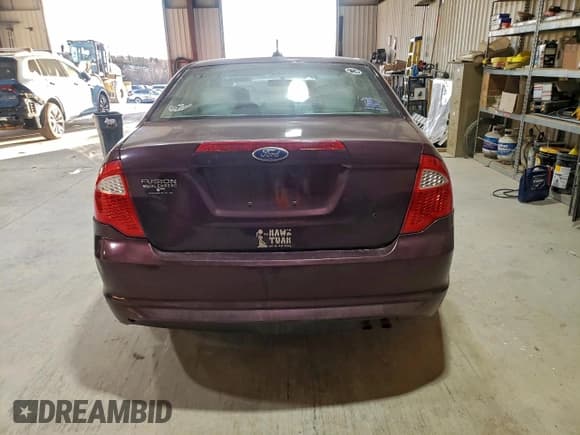 ✅ 2011 Ford Fusion S • VIN: 3FAHP0GAXBR260203 • Лот: 93601985. Опубликован ранее на Copart с пробегом 215 661 миль. Бесплатный доступ к архиву аукционных продаж из США и подробный отчёт об истории автомобиля на DreamBid. Изображение 6.