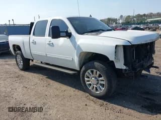 ✅ 2014 Chevrolet Silverado 2500HD LT • VIN: 1GC1KXCG1EF122256 • Lot: 42109783. Listed on IAAI with 152,052 mi. Free auction sales archive from the USA and detailed vehicle history report at DreamBid. Image 1.