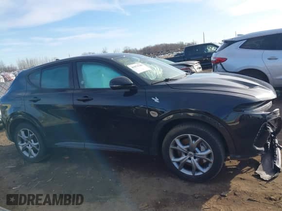 2024 Dodge Hornet R/T with VIN ZACPDFCW9R3A33499, listed as a IAAI auction lot 41876780 with 31,883 mi miles and . Bid and sale history available at DreamBid. Image 12.