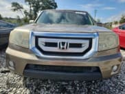 ✅ 2010 Honda Pilot Touring • VIN: 5FNYF4H98AB039661 • Lot: 85287425. Wystawiony na Copart z przebiegiem 234 478 mil. Bezpłatny archiwum sprzedaży aukcyjnych z USA i szczegółowy raport historii pojazdu na DreamBid. Zdjęcie 5.