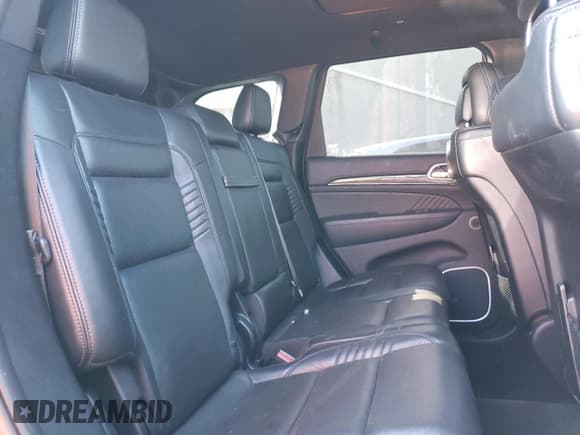 ✅ 2018 Jeep Grand Cherokee • VIN: NJ1454E • Lot: 48051693. Listed on Copart with 66,894 mi. Free auction sales archive from the USA and detailed vehicle history report at DreamBid. Image 11.