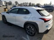 ✅ 2022 Lexus UX 250h • VIN: JTHX9JBH2N2056285 • Lot: 87221214. Listed on Copart with 33,377 mi. Free auction sales archive from the USA and detailed vehicle history report at DreamBid. Image 2.
