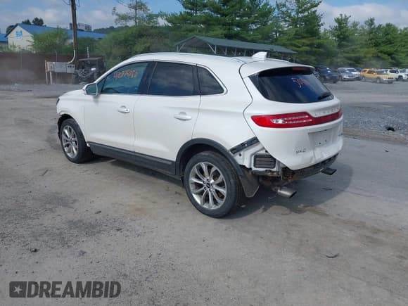 ✅ 2016 Lincoln MKC Select • VIN: 5LMTJ2DHXGUJ18266 • Lot: 42775080. Listed on IAAI with 102,755 mi. Free auction sales archive from the USA and detailed vehicle history report at DreamBid. Image 3.